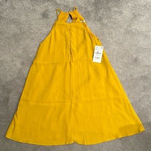 NWT Mustard Dress with Front and Back Key Holes